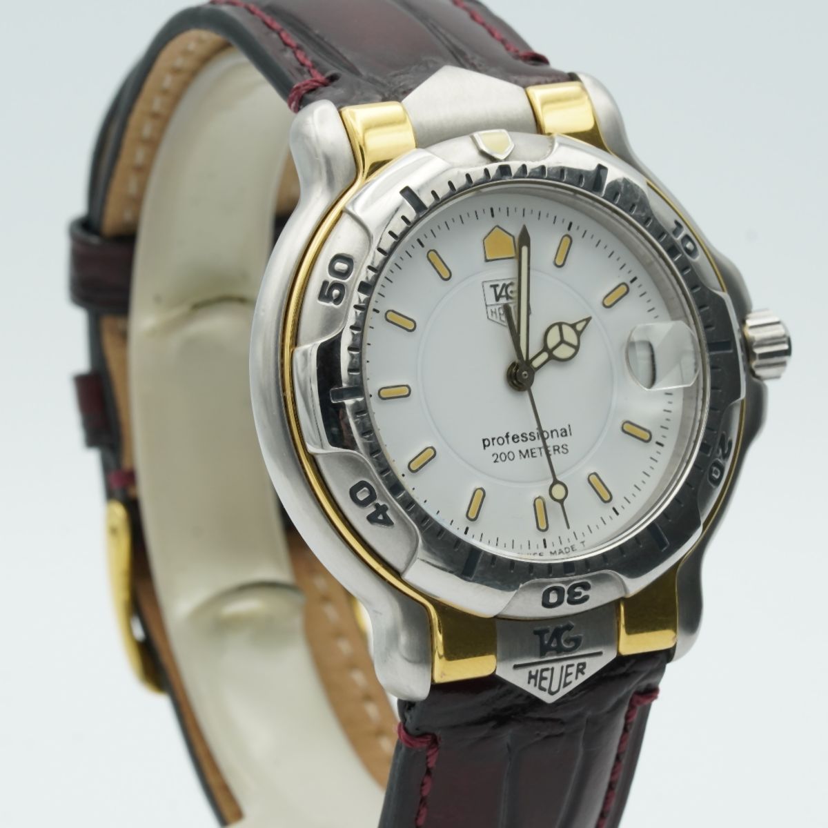 TAG HEUER PROFESSIONAL 6000 HERREN UHR 39MM WH1111 QUARTZ VINT STAHL GOLD Uhrenatelier Halle